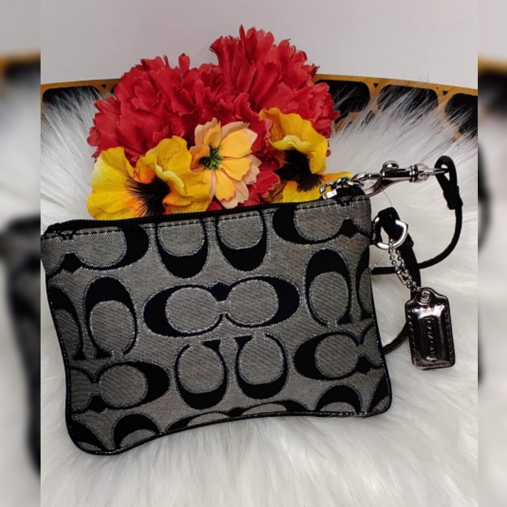 Black Coach Poppy wristlet bag